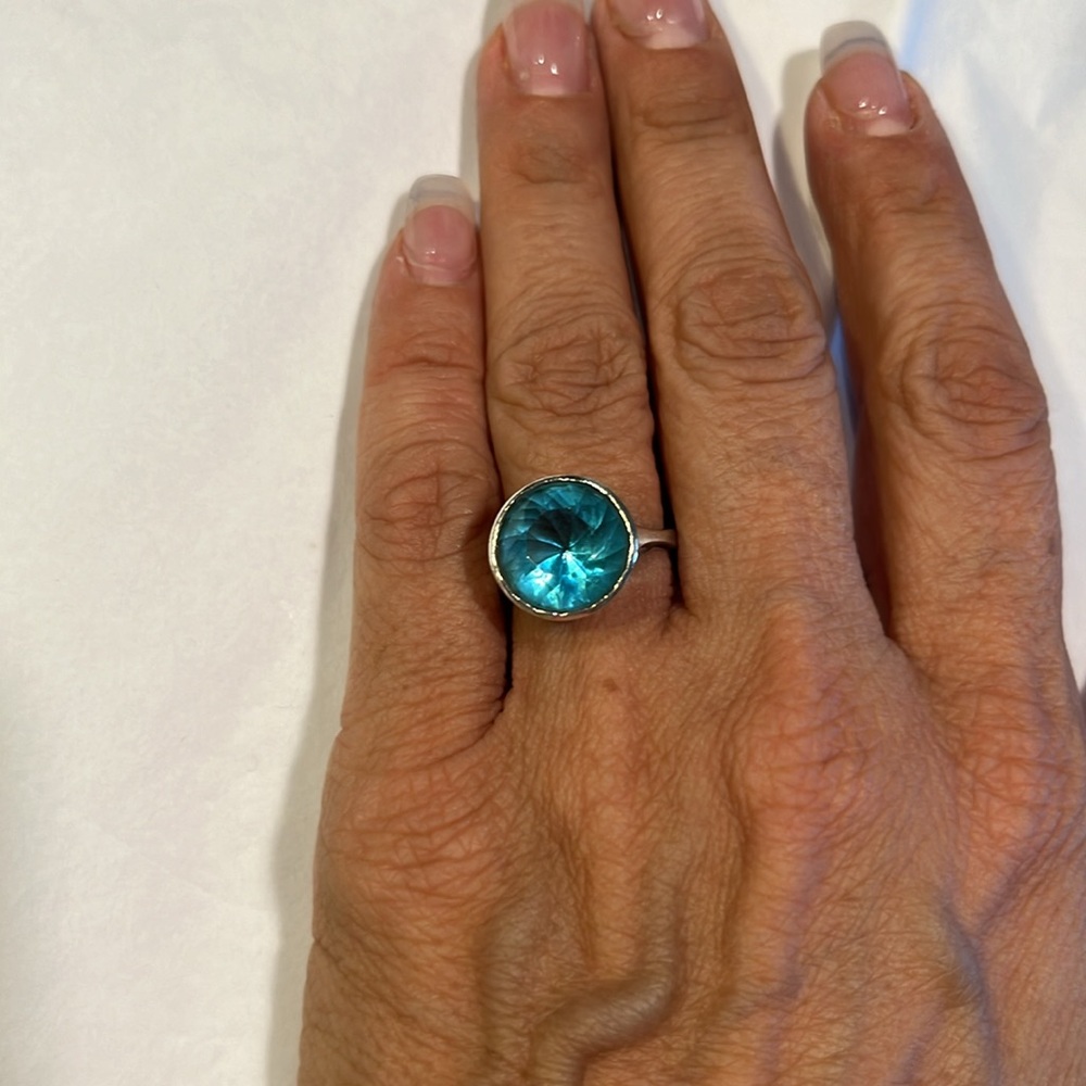 Blue topaz stone set in sterling silver.